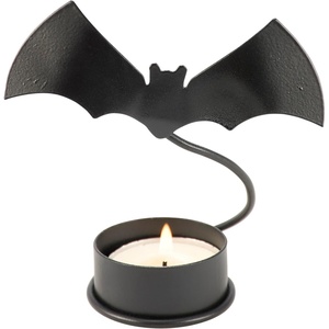 image:imagePrimitives by Kathy Decorative Candle Holder from Our Halloween Collection with a Metal bat Cutout Attached to a Metal Piece Gives Appearance of a Flying bat Above The Base and Candle