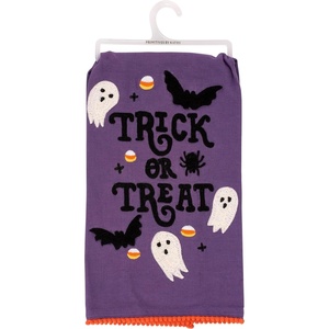 image:imagePrimitives by Kathy Decorative Kitchen Towel from Our Halloween Collection displays a Design of Ghosts Bats Candy Corns Around a Trick Or Treat Sentiment