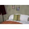 image:imagePrimitives by Kathy Pillow with Decorative Cover from Our Lake amp Cabin Collection displaying a Rustic Green Brown and Orange Stripe Pattern on the Front Inspired by Vintage Cabin Home dcorStriped Green