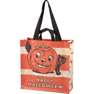 image:imagePrimitives by Kathy doublesided market tote from our Halloween Collection displaying a vintage design of a jack olantern and black cat above a Happy Halloween sentiment
