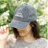 image:imagePrimitives by Kathy Baseball Cap  Here for The Snacks Black Unisex Stonewashed Black with Adjustable Metal Buckle